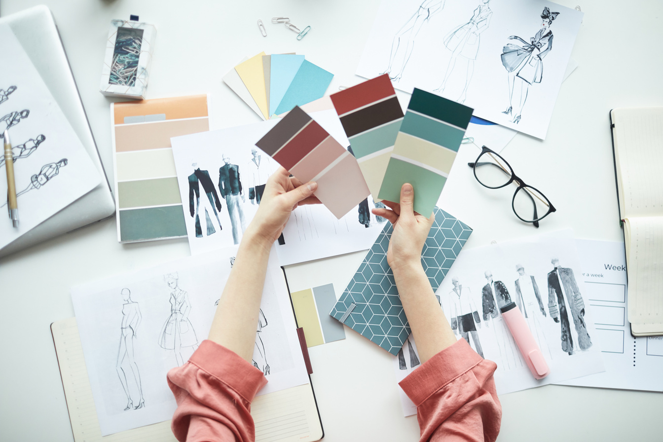 Female Fashion Designer Choosing Palette for Collection